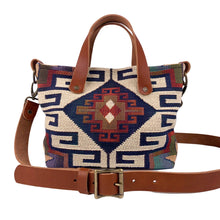 Load image into Gallery viewer, Front view of women&#39;s southwestern mini tote handbag. Chestnut brown leather handles with a removable, buckle adjustable strap.  Antique brass hardware.
