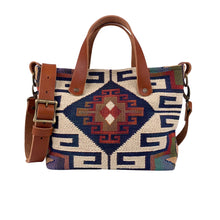 Load image into Gallery viewer, Front view of women&#39;s southwestern mini tote handbag. Chestnut brown leather handles with a removable, buckle adjustable strap.  Antique brass hardware.
